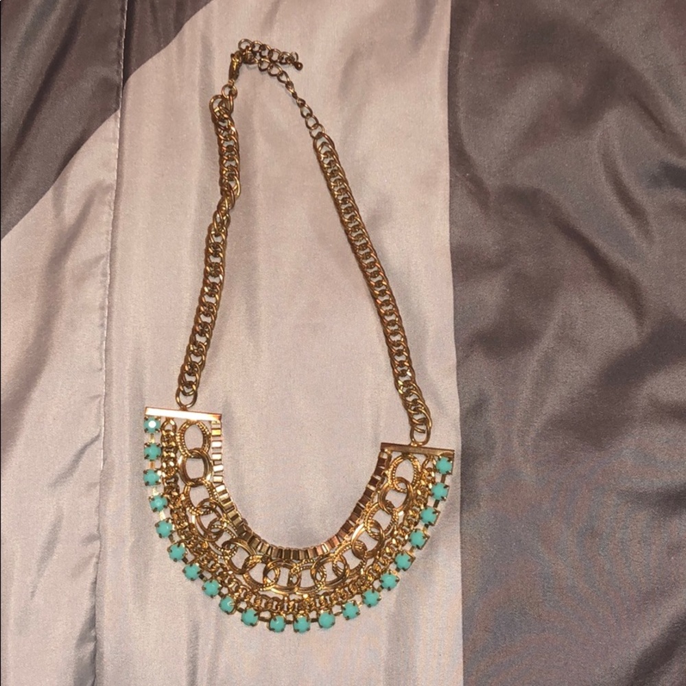 Bulky gold and blue necklace